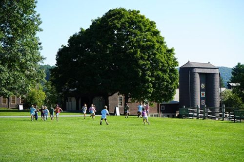 Barn Quilt Silos with Kids Playing 600px